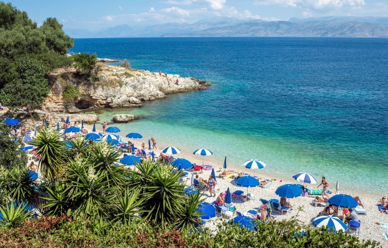 corfu sandy beach and turquoise waters of the ionian sea